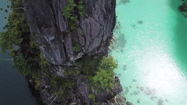 Aerial View of Double White Sand Beach Lagoon Divided With Steep Cliff. El Nido, Palawan Island, Philippines