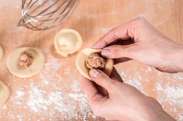 Close up and selective focus of making dumplings