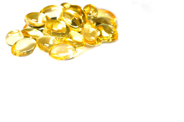 fish oil capsules on a white background