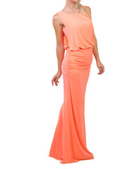 Beautiful woman dressed in evening gown over white background