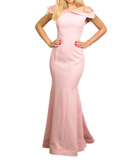 Beautiful woman dressed in evening gown over white background