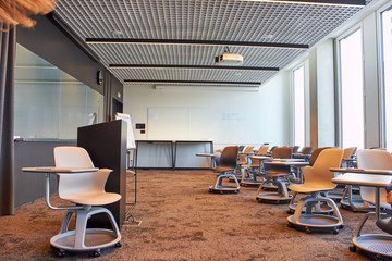 Modern conference room interior with movable chairs