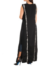 Beautiful woman dressed in evening gown over white background