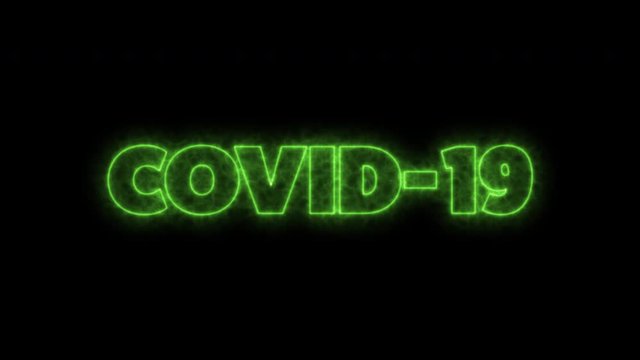 COVID-19 text word written in glowish dark green letters on a black background. Animated Graphic motion design illustration advertising 4K UHD. Health, security, Pandemic, world lockdown.