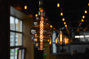 Edison light bulb in the interior of a cafe