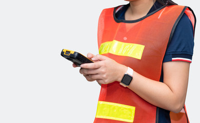 Woman warehouse worker using smartphone on white background