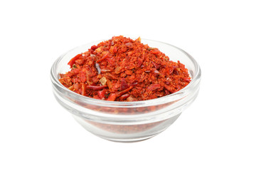 Bowl with pepper powder spice isolated on white background