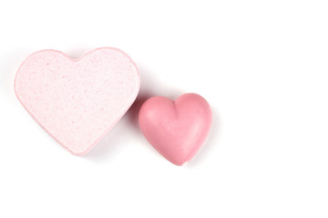 Obraz premium soap-heart and bath bomb pink, hand made isolated on white