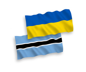 Flags of Botswana and Ukraine on a white background