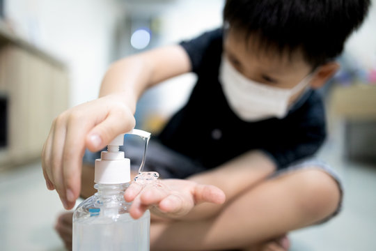 Hands Of Kid Boy With Alcohol Antiseptic Gel,wash Hands With Hand Sanitizer,kill Germs,bacteria,viruses,asian Child Wearing Face Mask,cleaning,disinfection,prevent Infection Of Covid-19,Coronavirus