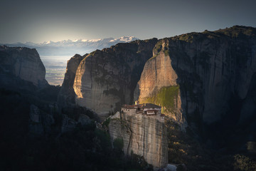 Fototapeta na wymiar Meteora is included in the UNESCO World Heritage Site. Meteora is a big monastery complex including nine reserved monastery built on top of difficult high cliffs resembling stone pillars 400 meters