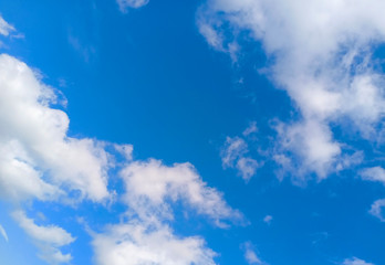 white fluffy clouds on beautiful blue sky