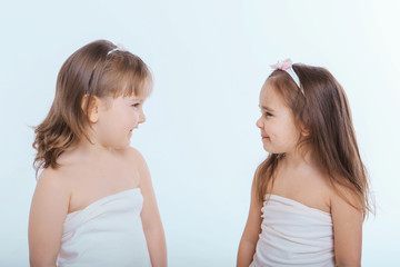 two happy girls smiling. Portrait of women hugging. The concept of relationships in the family, friends, sisters, couple in love