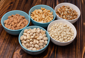 Healthy food and snack. Walnuts almonds, pistachios, cashews, peanuts
