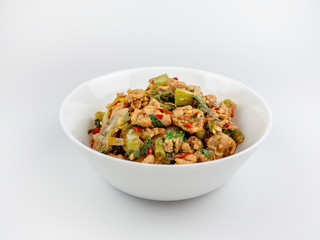 Stir-fried chicken with holy basil on white background., hot and spicy food
