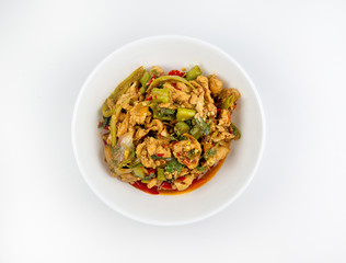 Stir-fried chicken with holy basil on white background., hot and spicy food