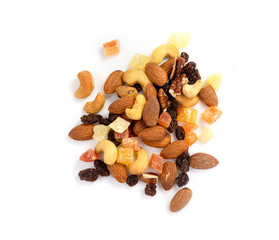 Mix of various nuts and dried fruit on white, Almonds, Raisins, Nuts, top view..