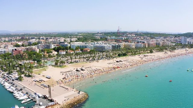 Endless multi-kilometer beach of Salou with a quadrocopter. The best place to stay for tourists from all over the world.