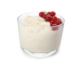 Delicious rice pudding with redcurrant isolated on white