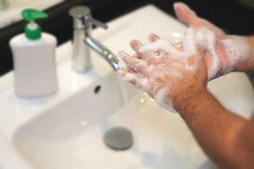 man washing hands