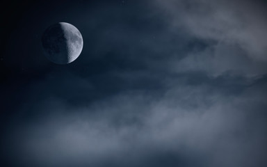 Naklejka na ściany i meble Half moon on night sky with clouds Super moon