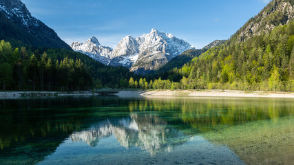 Jasna lake at Kranjska Gora in Slovenia, Europe on a beautiful spring morning.