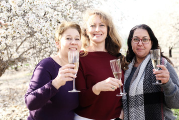 Outdoor portrait of best friends women celebrating the end of isolation