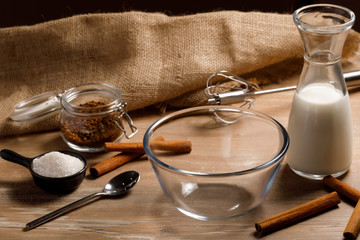 Cooking step-by-step Korean Dalgona coffee. Set of products: instant coffee, milk, water, sugar. Step 1