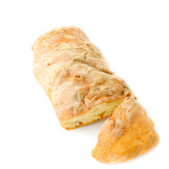 Closeup France long bread slice isolated on white background, top view of healthy bakery 