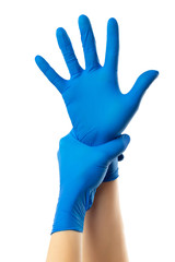 Doctor putting on protective medical gloves, isolated on white. Concept of coronavirus protection.