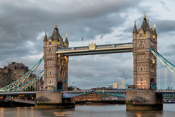 Fototapeta na wymiar Spectacular Tower Bridge in London, UK at evening time with dramatic clouds.