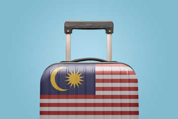 Baggage with Malaysia flag print tourism and vacation concept.