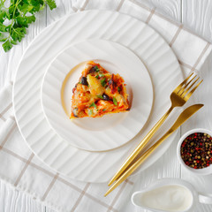 Baked chicken tamale pie view from above, close-up