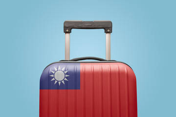 Baggage with Taiwan flag print tourism and vacation concept.