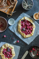 Rustic baking ingredients and kitchen utensils. Homemade pastry, baking. Top view flat lay background. Healthy fresh organic food.