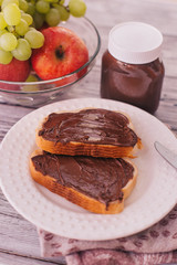 chocolate paste toast with banana for Breakfast, fruit