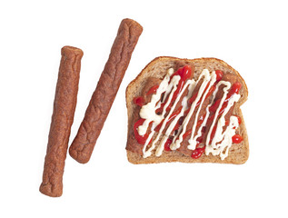 Chopped up frikadel with ketchup and mayonnaise on a piece of bread, a Dutch fast food snack