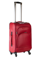 red suitcase on wheels for travel