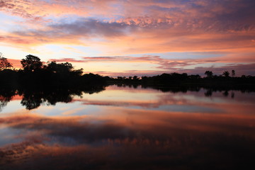 Fototapeta na wymiar Landscape of Amazon jungle river during sunrise in Brazil