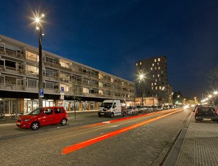 Fototapeta na wymiar City of Diemen at night. Netherlands. Lamp posts at twilight