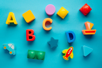 letters abcd on a blue background. layout. children's background