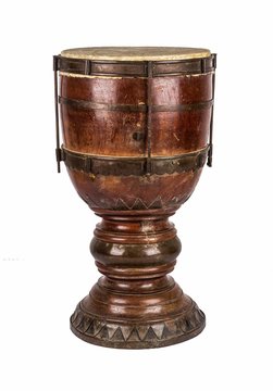 Closeup shot of wooden tombak isolated on a white background