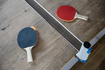 Top view DIY transform your home dining table into a table tennis. Staying at home during the...