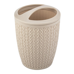 light beige glass for storing toothbrushes and toothpaste in the bathroom