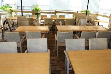 Athens, Greece, May 6 2020 - Empty cafe-restaurant during the Coronavirus lockdown.