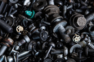 Flat Lay metal fasteners: vinitics, screws, nuts, nails, interchangeable heads, top view. Close-up Carpenter's Tool Kit