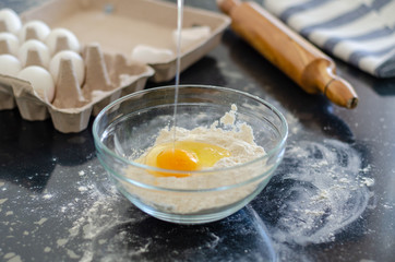 Woman is preparing dough