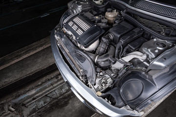 Car engine close-up. Internal combustion engine, car parts, deteyling. Parsing jankyard.