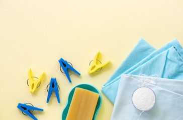 Flat lay of laundry items on a light background