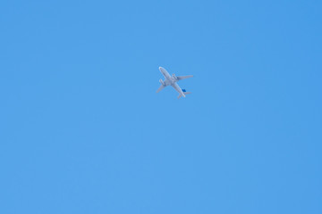airplane flying in the sky of San Diego (USA)